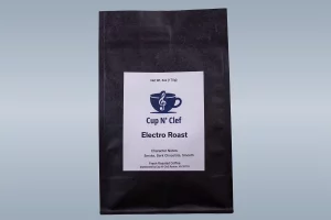 Cup N' Clef Electro Roast coffee bag, highlighting character notes of smoke, dark chocolate, and smooth texture.
