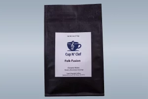 Cup N' Clef Folk Fusion coffee bag, showcasing character notes of raisin, chocolate, and caramel.
