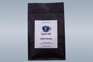 Cup N' Clef Indie Melody coffee bag, showcasing character notes of apple, sweet, and milk chocolate.